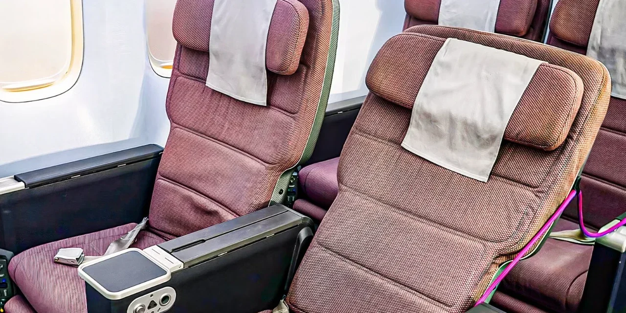 Premium airline seats inside a modern aircraft cabin showcasing upgraded passenger comfort and style.