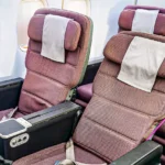 Premium airline seats inside a modern aircraft cabin showcasing upgraded passenger comfort and style.