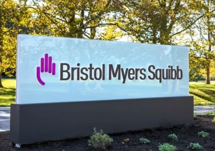 Bristol Myers Squibb headquarters sign outside office campus announcing AI and life sciences expansion initiative.