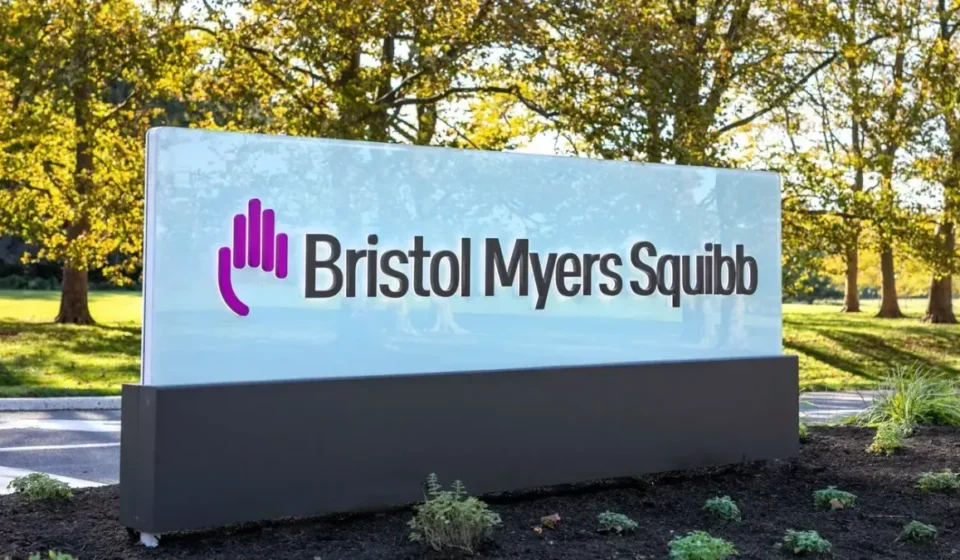 Bristol Myers Squibb headquarters sign outside office campus announcing AI and life sciences expansion initiative.