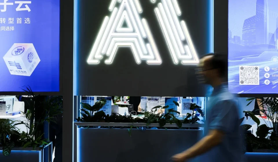 Glowing AI sign at a Chinese technology exhibition highlights advances in artificial intelligence AI.