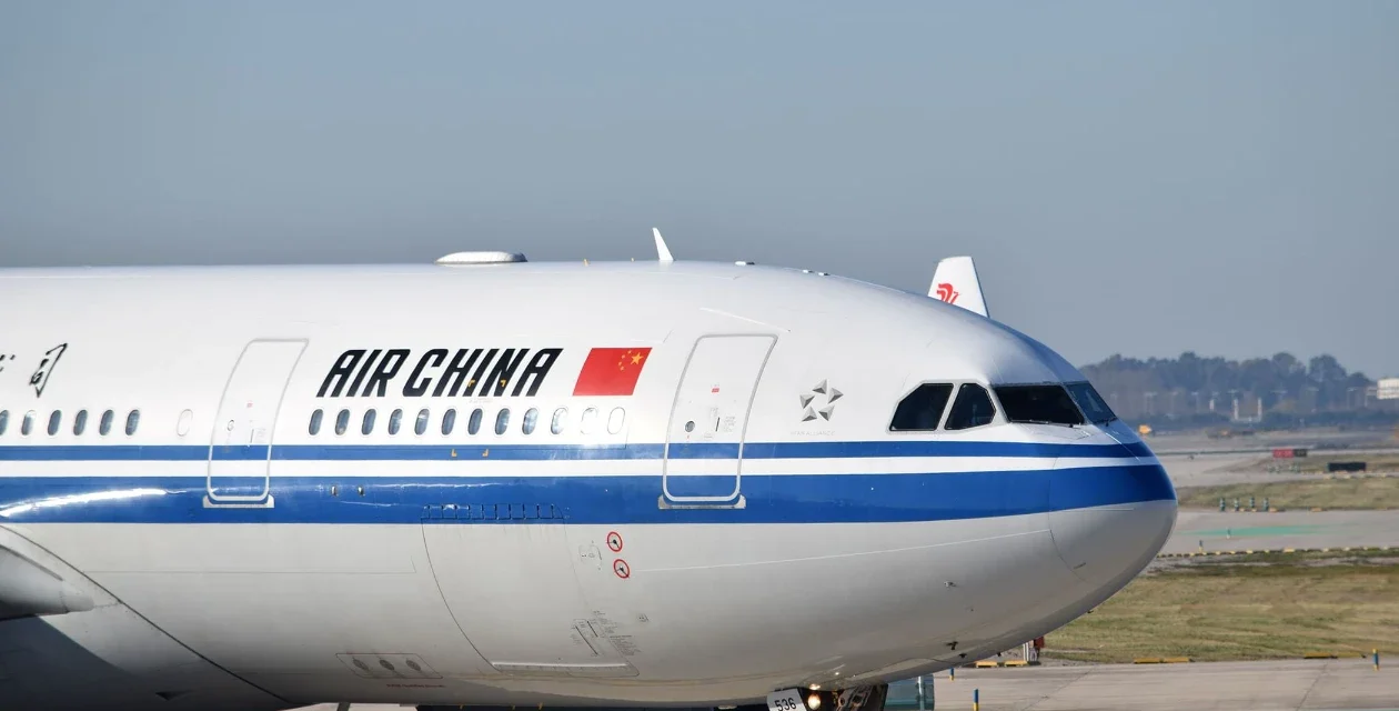 Air China Airbus passenger jet parked on the airport tarmac before an international commercial flight departure.