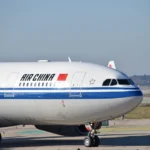 Air China Airbus passenger jet parked on the airport tarmac before an international commercial flight departure.