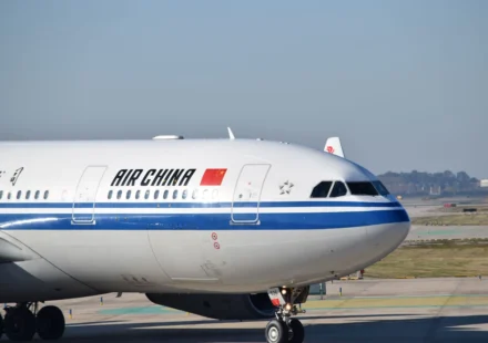 Air China Airbus passenger jet parked on the airport tarmac before an international commercial flight departure.