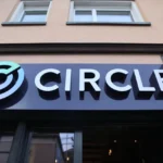 Circle office sign on building exterior after US national trust bank charter approval for US finance