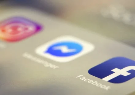 Social media app icons on a smartphone screen representing online platforms facing new safety rules.