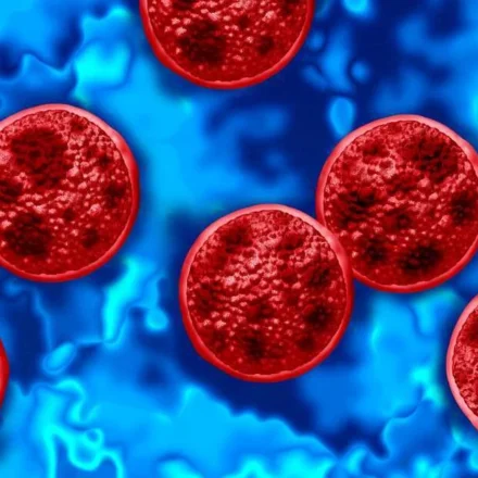 Illustration of Cyclospora parasites on a blue background representing the nationwide produce recall
