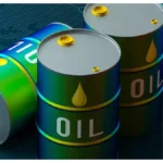 Oil barrels displayed with global market charts showing rising crude oil prices and energy trends.