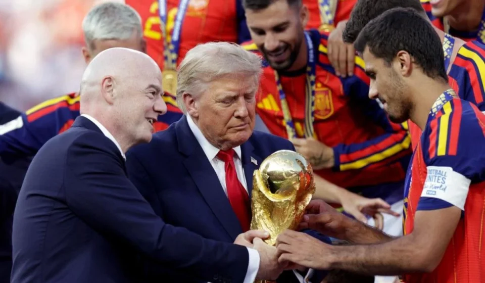 FIFA President Gianni Infantino presents trophy as Spain celebrates title with officials on stage