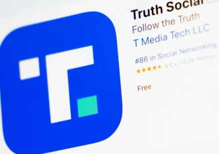 Truth Social app listing displayed on a mobile screen highlighting the platform and its branding online.