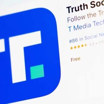 Truth Social app listing displayed on a mobile screen highlighting the platform and its branding online.