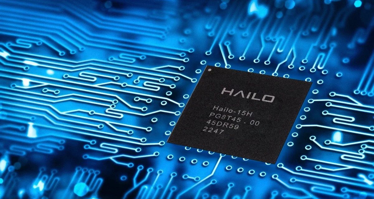 Hailo edge AI processor chip displayed on a blue circuit board representing advanced embedded AI technology.