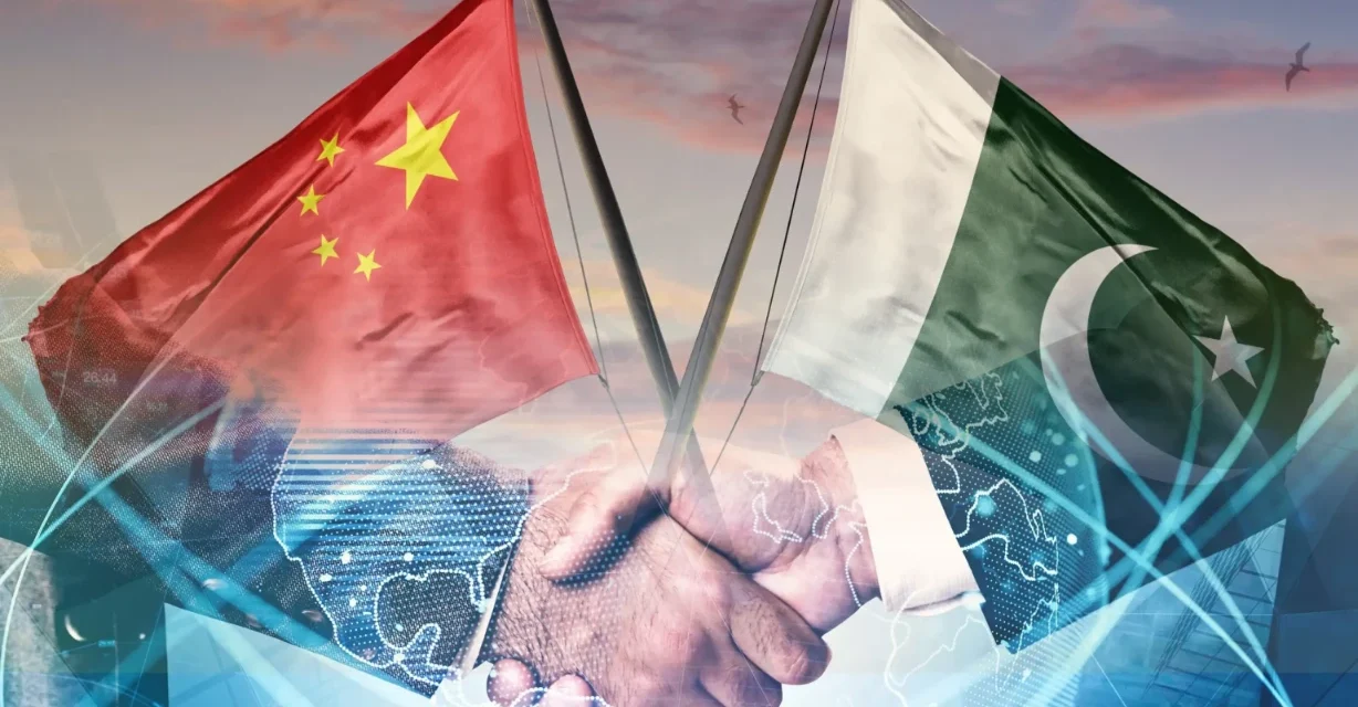 Pakistan and China flags over handshake symbolizing AI alliance and digital cooperation under CPEC 2.0 plan.
