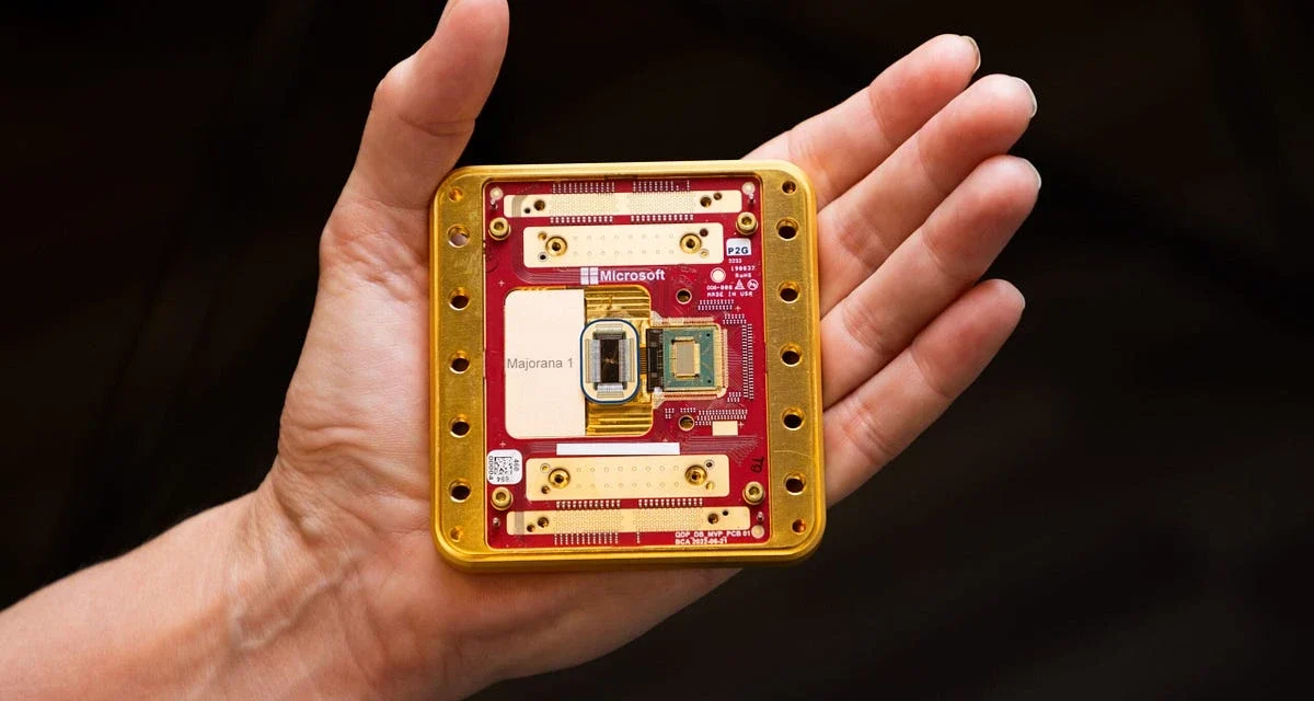 Hand holding a Microsoft quantum computing chip prototype showcasing advanced quantum hardware design.