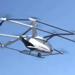 SkyDrive eVTOL aircraft flying in clear blue sky for future emergency medical transport services offshore.
