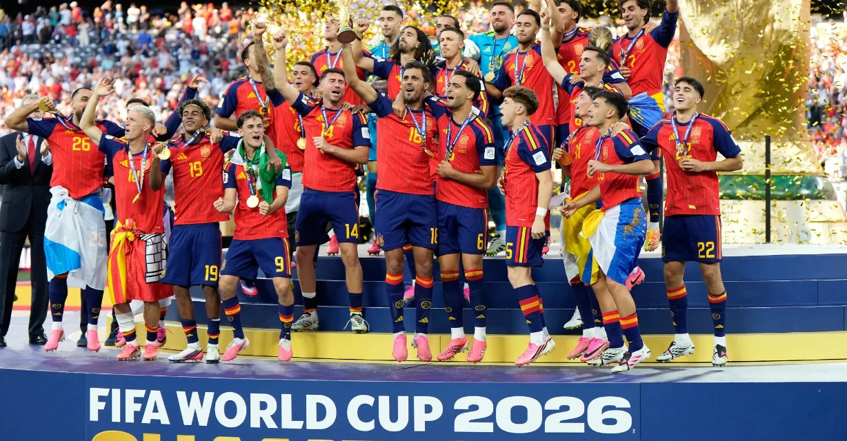 Spain players celebrate lifting the FIFA World Cup 2026 trophy after a 1 to 0 victory over Argentina.