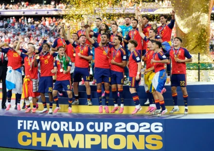 Spain players celebrate lifting the FIFA World Cup 2026 trophy after a 1 to 0 victory over Argentina.