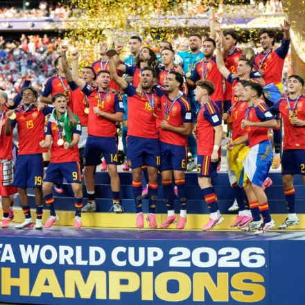 Spain players celebrate lifting the FIFA World Cup 2026 trophy after a 1 to 0 victory over Argentina.