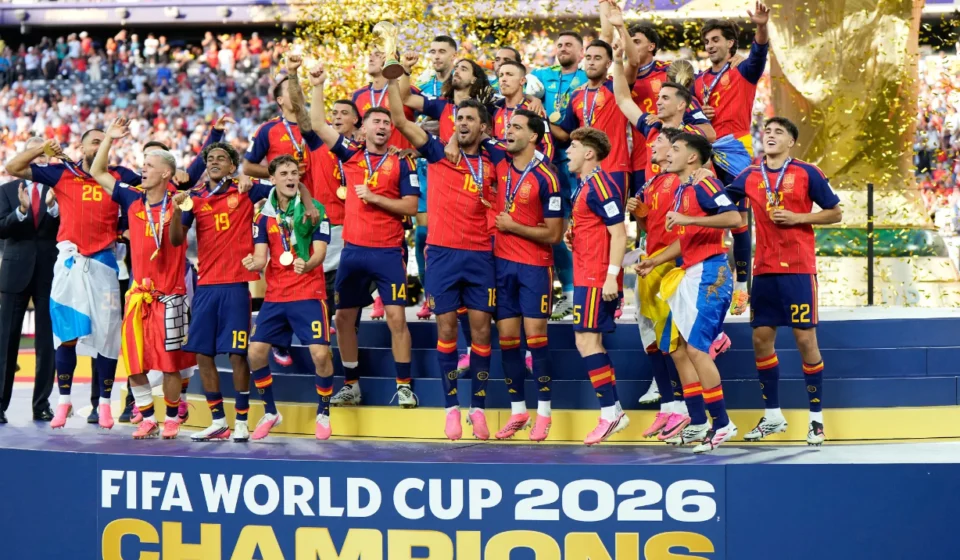 Spain players celebrate lifting the FIFA World Cup 2026 trophy after a 1 to 0 victory over Argentina.