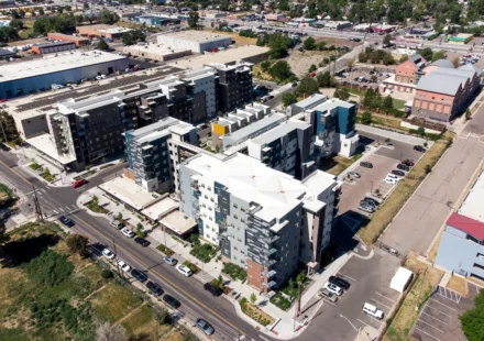 Aerial view of modern mixed use residential buildings in a growing urban redevelopment district near roads