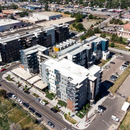 Aerial view of modern mixed use residential buildings in a growing urban redevelopment district near roads
