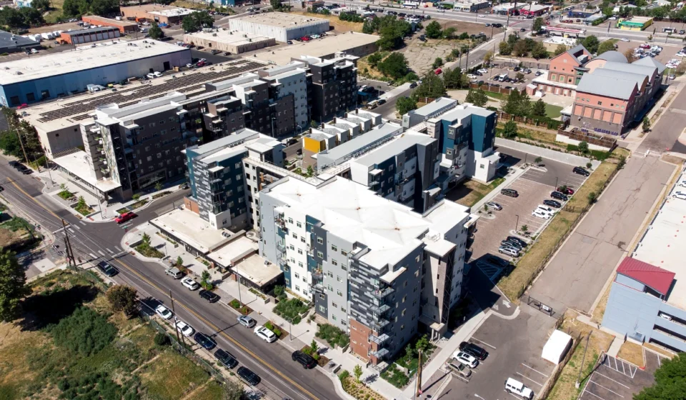 Aerial view of modern mixed use residential buildings in a growing urban redevelopment district near roads
