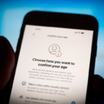 Smartphone displaying an age verification screen with privacy focused identity confirmation options online.
