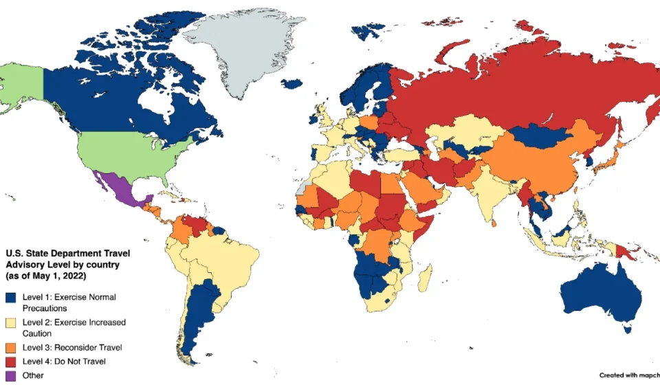 World map showing U.S. State Department travel advisory levels across countries by security risk status.