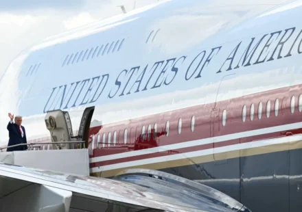 US president waves beside Air Force One before departure amid heightened security during overseas trip