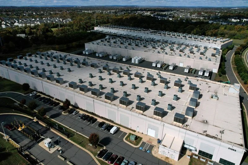 Aerial view of a large energy data center supporting AI driven power grid research and infrastructure.