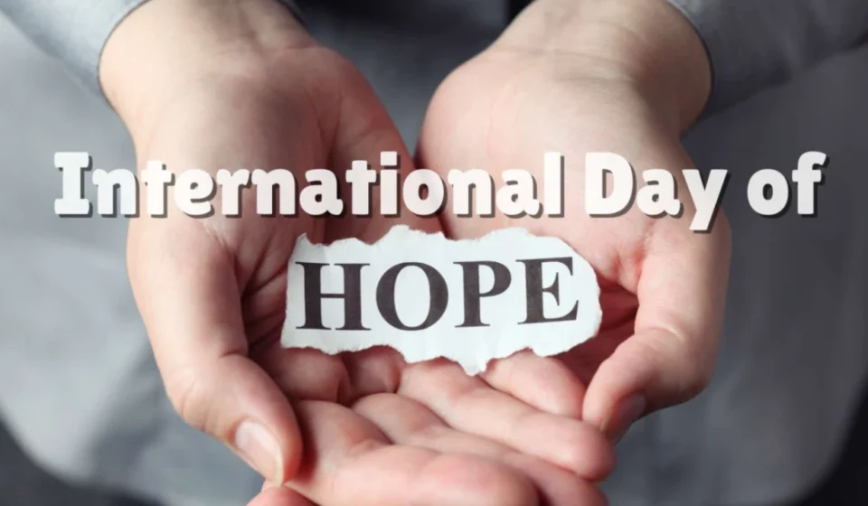 Hands gently holding a paper reading Hope, symbolizing the United Nations International Day of Hope.
