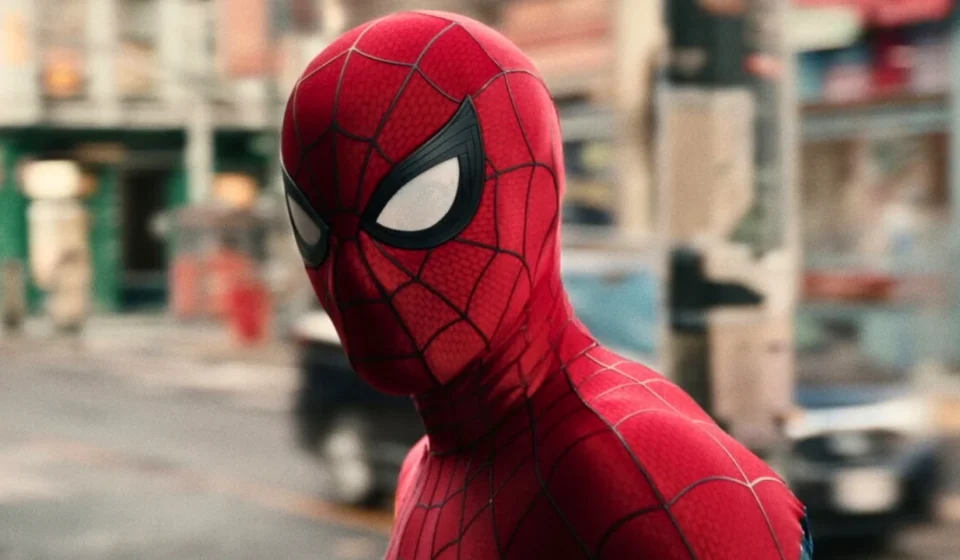 ‘Spider-Man: Brand New Day’ Shatters Global Box Office Records Spider Man in his iconic red suit stands on a city street, looking over his shoulder in daylight.