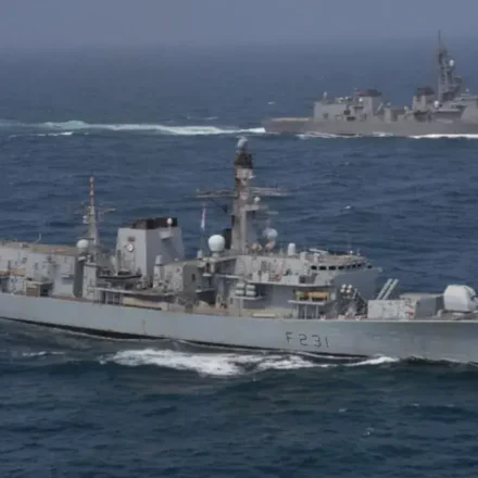 Two naval frigates patrol open waters during Red Sea maritime security coalition operations