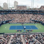 Packed crowd watches opening matches on hard court at Toronto's Sobeys Stadium during Canadian Open.