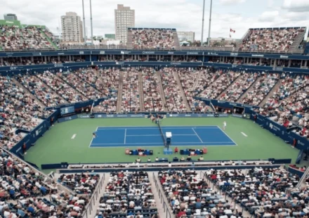 Packed crowd watches opening matches on hard court at Toronto's Sobeys Stadium during Canadian Open.
