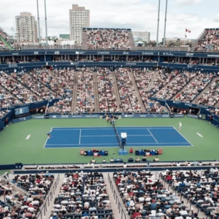 Packed crowd watches opening matches on hard court at Toronto's Sobeys Stadium during Canadian Open.