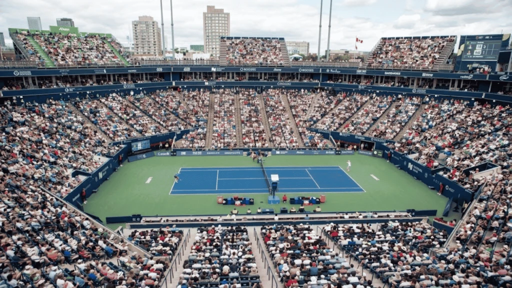 Packed crowd watches opening matches on hard court at Toronto's Sobeys Stadium during Canadian Open.