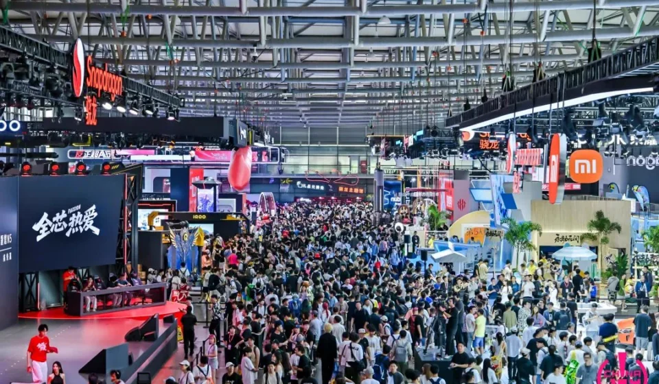 Crowds explore gaming booths and hardware displays during the ChinaJoy 2026 expo in Shanghai, China.