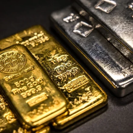 Gold and silver bullion bars stacked together, reflecting demand for precious metals in markets now.