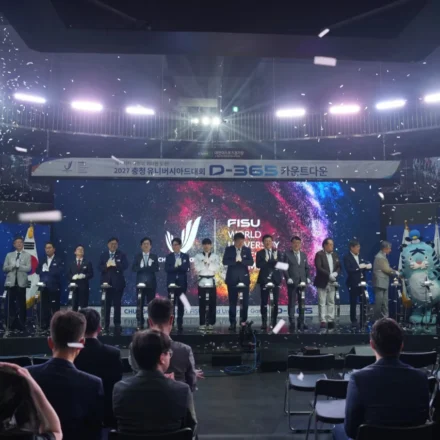 Officials celebrate the 2027 World University Games one year countdown at Daejeon Dream Arena stage.