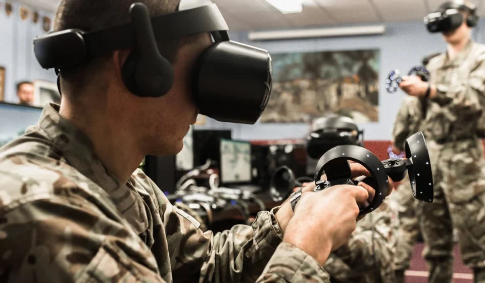 Defense Forces Adopt Gaming Simulation Engines for Tactical Operations Military personnel use virtual reality headsets and controllers during immersive tactical combat training simulation.