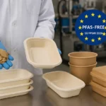 Scientist examines PFAS free food containers and packaging under new EU PPWR rules in a lab setting.