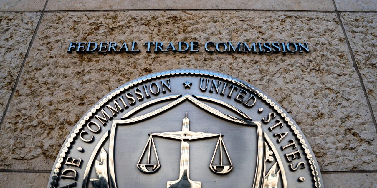 Federal Trade Commission seal displayed outside FTC headquarters building in Washington, DC entrance sign.