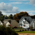Suburban neighborhood with modern family homes reflecting rising metro housing market prices nationwide.