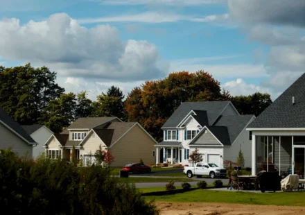 Suburban neighborhood with modern family homes reflecting rising metro housing market prices nationwide.
