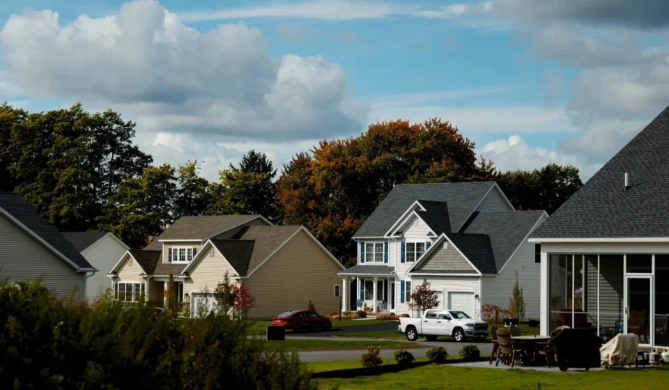 Global Property Report Shows Metro Home Prices Rising in 80% of Markets Suburban neighborhood with modern family homes reflecting rising metro housing market prices nationwide.