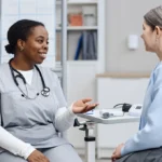 Healthcare provider discusses perimenopause symptoms with patient during a clinic consultation. care