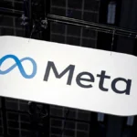 Meta company logo displayed on a suspended sign during a technology event inside an exhibition hall.