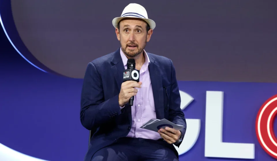 Top Forbes Editor Dismissed Over Undisclosed $6M Payment Randall Lane speaks into a microphone at the Global Citizen Now event.