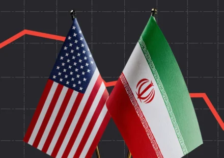 United States and Iranian flags before a market chart symbolizing renewed diplomatic talks worldwide